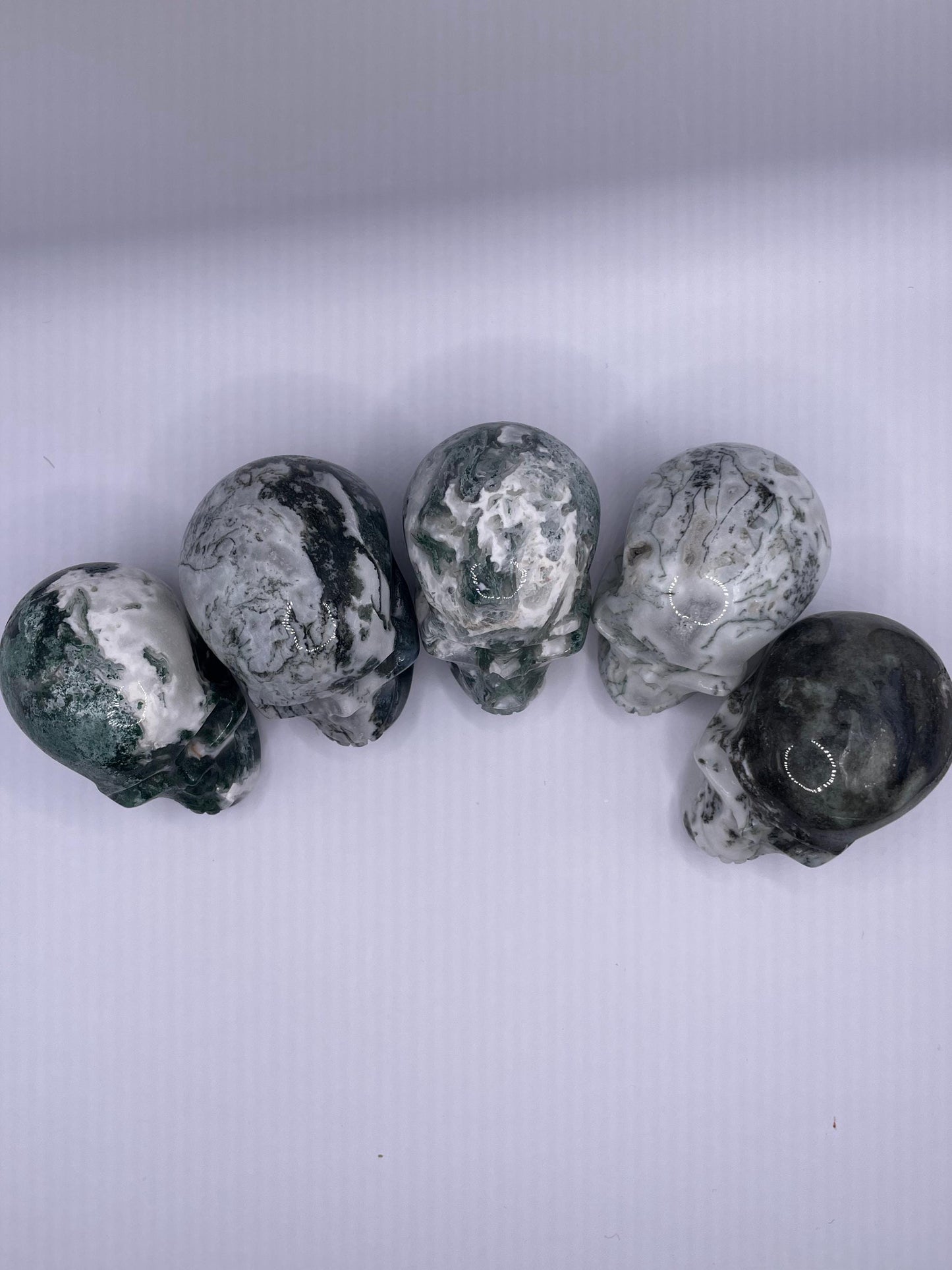 Moss Agate Skulls