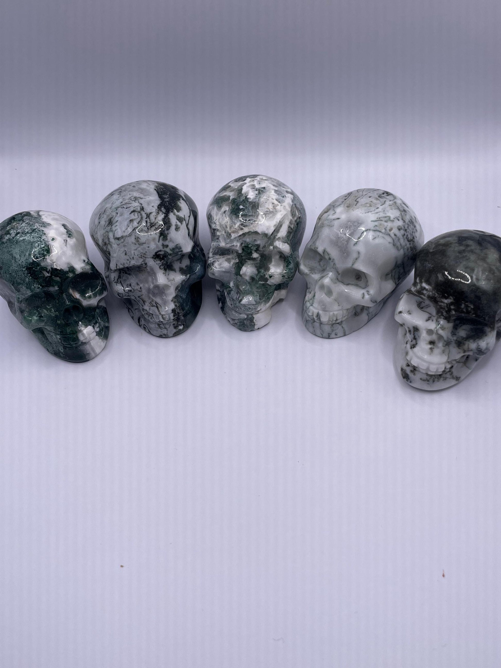 Moss Agate Skulls